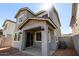 Two-story home with a covered patio, stucco exterior, a brown roof, and multiple windows at 9350 E Sequence Ave, Mesa, AZ 85212