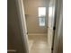 Bright laundry room with tile floor and ample shelving at 9358 E Sequence Ave, Mesa, AZ 85212