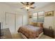 Serene bedroom with double doors and a plush bed at 1291 S Ponderosa Dr, Gilbert, AZ 85296