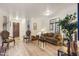 Living room with hardwood floors and comfortable furniture at 1291 S Ponderosa Dr, Gilbert, AZ 85296