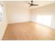 Bright bedroom with light wood floors and large windows at 14806 N Yerba Buena Way # D, Fountain Hills, AZ 85268