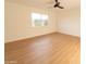 Bright bedroom with light wood floors and a ceiling fan at 14806 N Yerba Buena Way # D, Fountain Hills, AZ 85268