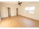 Bright bedroom with light wood floors and double closets at 14806 N Yerba Buena Way # D, Fountain Hills, AZ 85268