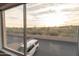 View from window shows a residential area and parking at 14806 N Yerba Buena Way # D, Fountain Hills, AZ 85268
