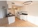 Modern kitchen with white cabinets and dark countertops at 14806 N Yerba Buena Way # D, Fountain Hills, AZ 85268