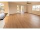 Large living room, light wood floors and access to patio at 14806 N Yerba Buena Way # D, Fountain Hills, AZ 85268