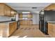 View of kitchen with wood cabinets and appliances at 1519 E 7Th Dr, Mesa, AZ 85204