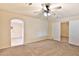 Bright bedroom with ceiling fan and carpet flooring at 1616 N 48Th Ln, Phoenix, AZ 85035