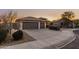 A two-car garage and driveway complete this home at 18193 W Buckhorn Dr, Goodyear, AZ 85338