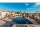 Relaxing pool area with ample space for lounging and entertaining at 18193 W Buckhorn Dr, Goodyear, AZ 85338