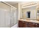 Bathroom with shower/tub combo and double vanity at 18536 W Douglas Way, Surprise, AZ 85374