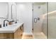 Modern bathroom with double vanity, large shower, and stylish fixtures at 1890 E Palmcroft Dr, Tempe, AZ 85282