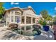 A luxurious backyard pool with rock accents and a covered patio, perfect for outdoor entertaining at 1923 E Drake Dr, Tempe, AZ 85283