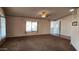 Spacious living room with large window and carpet at 2233 E Behrend Dr # 115, Phoenix, AZ 85024