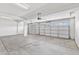 Spacious three car garage with high ceilings, and automatic door openers at 2338 N 112Th Ln, Avondale, AZ 85392
