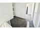 Second floor hallway features gray carpet, white trim and access to bedrooms at 2338 N 112Th Ln, Avondale, AZ 85392