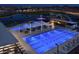 Large community lap pool and leisure pool with surrounding lounge areas at 26128 S 228Th Pl, Queen Creek, AZ 85142