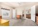 Bright bedroom with wood dresser and access to bathroom and closet at 2650 W Union Hills Dr # 231, Phoenix, AZ 85027