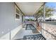 Mobile home exterior with covered porch and lattice railings at 2650 W Union Hills Dr # 231, Phoenix, AZ 85027