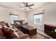 Living room with brown leather couches and a coffee table at 2650 W Union Hills Dr # 231, Phoenix, AZ 85027