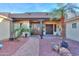 Welcoming entry with courtyard and unique door at 2728 N Meridian Rd, Apache Junction, AZ 85120