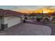 View of a spacious garage with brick driveway and desert landscape at 2728 N Meridian Rd, Apache Junction, AZ 85120