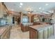 Gourmet kitchen with granite counters and wood cabinetry at 2728 N Meridian Rd, Apache Junction, AZ 85120