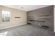 Bedroom with wood-paneled accent wall and shelving at 2977 E Teakwood Pl, Chandler, AZ 85249