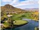 Aerial view showcasing the Anthem Country Club's golf course and surrounding desert landscape at 3021 W Feather Sound Dr, Phoenix, AZ 85086