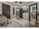 Bright bedroom with ensuite bathroom and calming decor at 3021 W Feather Sound Dr, Phoenix, AZ 85086