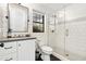 Bright bathroom featuring a glass shower, mosaic tile accents, and a modern vanity with stylish fixtures at 3048 N 45Th St, Phoenix, AZ 85018