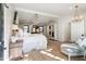 Spacious main bedroom featuring a chandelier, and white furniture for a bright and airy feel at 3048 N 45Th St, Phoenix, AZ 85018