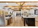 Open floorplan featuring a kitchen with an island, a dining area, and a living room at 3048 N 45Th St, Phoenix, AZ 85018