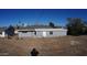 Large backyard with a mostly dirt area at 327 W Fairhaven Rd, Kearny, AZ 85137