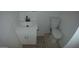Clean and updated bathroom with a white vanity at 327 W Fairhaven Rd, Kearny, AZ 85137
