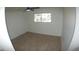 Bright bedroom with ceiling fan and wood-look flooring at 327 W Fairhaven Rd, Kearny, AZ 85137