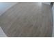 Light gray vinyl plank flooring throughout the home at 327 W Fairhaven Rd, Kearny, AZ 85137