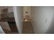 Long hallway with light gray vinyl plank flooring at 327 W Fairhaven Rd, Kearny, AZ 85137
