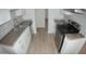 Modern kitchen with granite countertops and stainless steel appliances at 327 W Fairhaven Rd, Kearny, AZ 85137