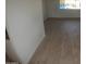 Living room with light wood-look flooring at 327 W Fairhaven Rd, Kearny, AZ 85137