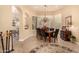 Elegant dining room with a chandelier and stylish furnishings at 3311 N 150Th Dr, Goodyear, AZ 85395