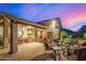 Outdoor patio with seating area, offering sunset views at 3311 N 150Th Dr, Goodyear, AZ 85395