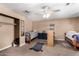 Bedroom with two twin beds, closet, and shelving at 3726 W Coolidge St, Phoenix, AZ 85019