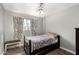 Bedroom with single bed and ceiling fan at 3726 W Coolidge St, Phoenix, AZ 85019