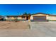 Ranch style home with a two-car garage and large front yard at 3726 W Coolidge St, Phoenix, AZ 85019