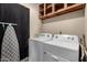 Functional laundry room with washer and dryer at 3726 W Coolidge St, Phoenix, AZ 85019