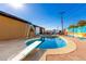 Inviting kidney shaped pool with diving board at 3726 W Coolidge St, Phoenix, AZ 85019