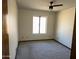 Simple bedroom with ceiling fan and carpet at 3850 E Equestrian Trl, Phoenix, AZ 85044