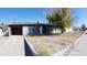 Ranch style home with carport and mature landscaping at 422 W Jamestown Rd, Kearny, AZ 85137