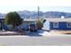 Home's exterior with landscaping and mountain backdrop at 422 W Jamestown Rd, Kearny, AZ 85137